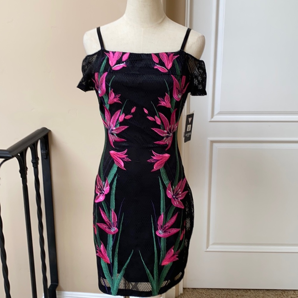 Black mesh lined floral fitted dress.